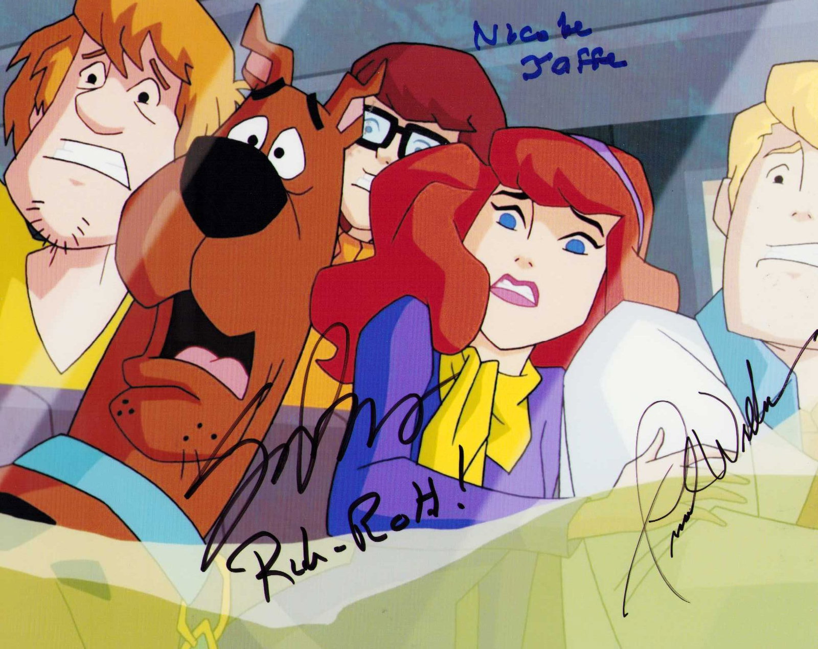 Scooby Doo cast signed photograph: An animated still signed by Frank Wellman as Freds voice Nicole Jaffe as the original voice of Velma and a recent voice star of Scooby Doo Certificate of AuthenticityEVERY item in this auction comes w