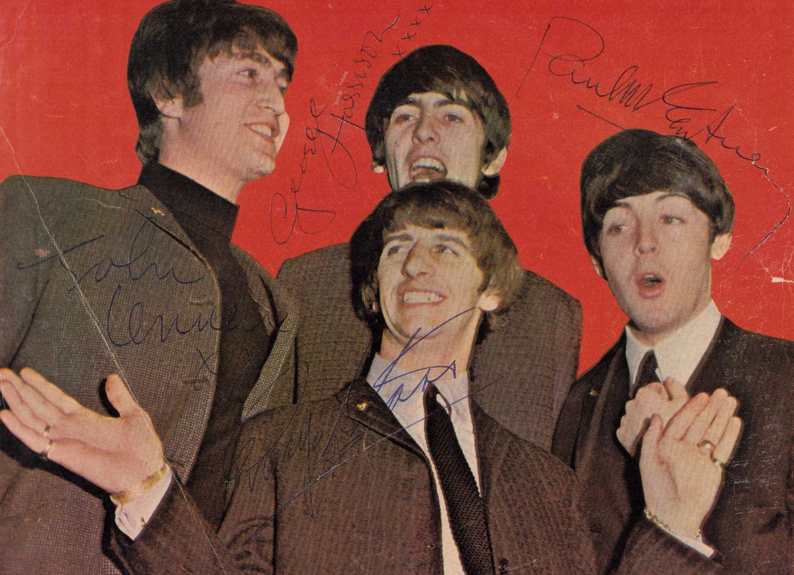 The Beatles signed photograph: An 8x10 from a fan magazine in the 60s signed in ball point ink by all four there are creases and condition issues all visible in scans but nothing to terribly detract from this historic signed item C