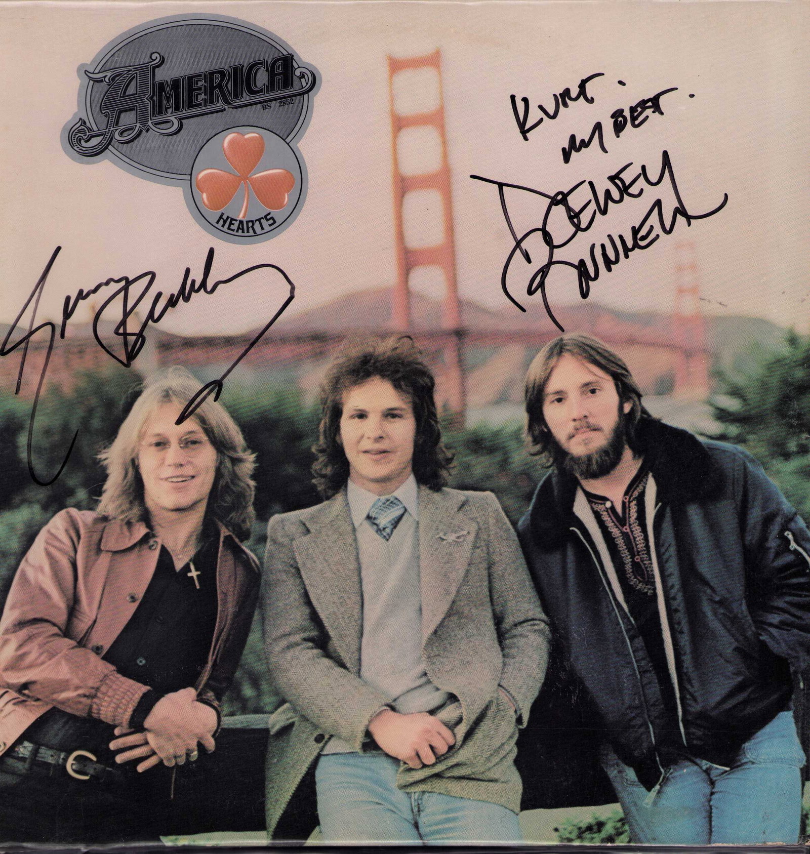 America signed LP: LP signed by two of the three man band known as America Certificate of AuthenticityEVERY item in this auction comes with at minimum one fully illustrated and serial numbered COA signed by the worlds l