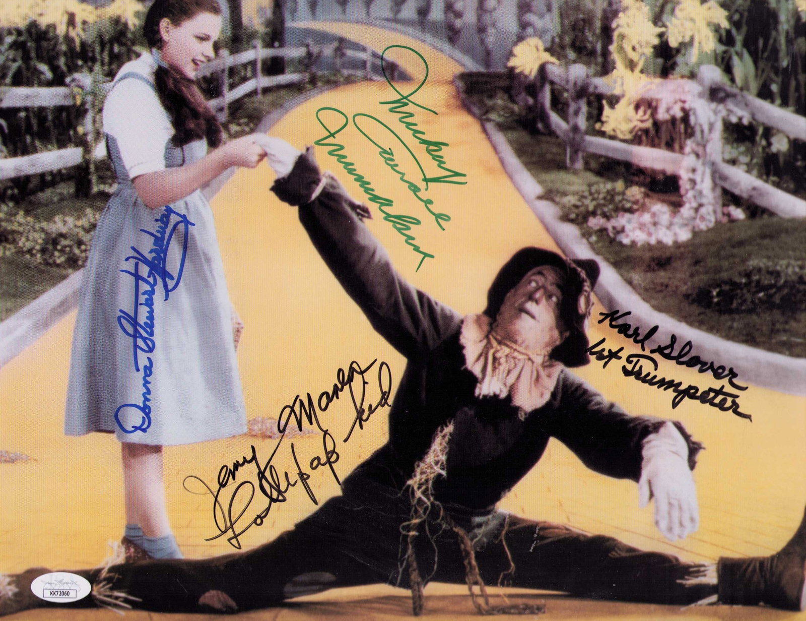 Wizard of Oz signed 11x14 photograph by multiple Munchkin stars: An 11x14 OZ image signed by multiple deceased Munchkin stars Karl Slover Mickey Carroll Donna Stewart and Jerry Maren Certificate of AuthenticityEVERY item in this auction comes with at minimum one fu