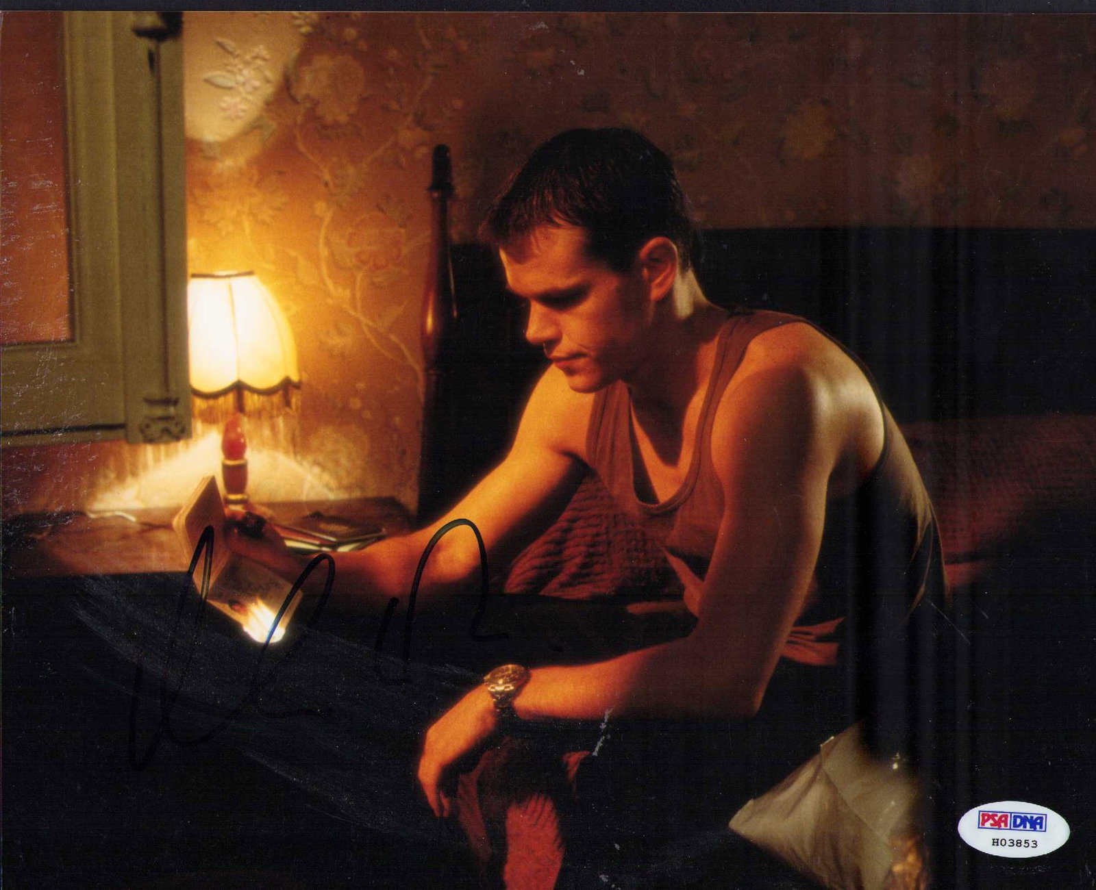 Matt Damon signed photograph PSA DNA: A PSA DNA Bourne film scene still signed by the actor Certificate of AuthenticityEVERY item in this auction comes with at minimum one fully illustrated and serial numbered COA signed by the worlds lea