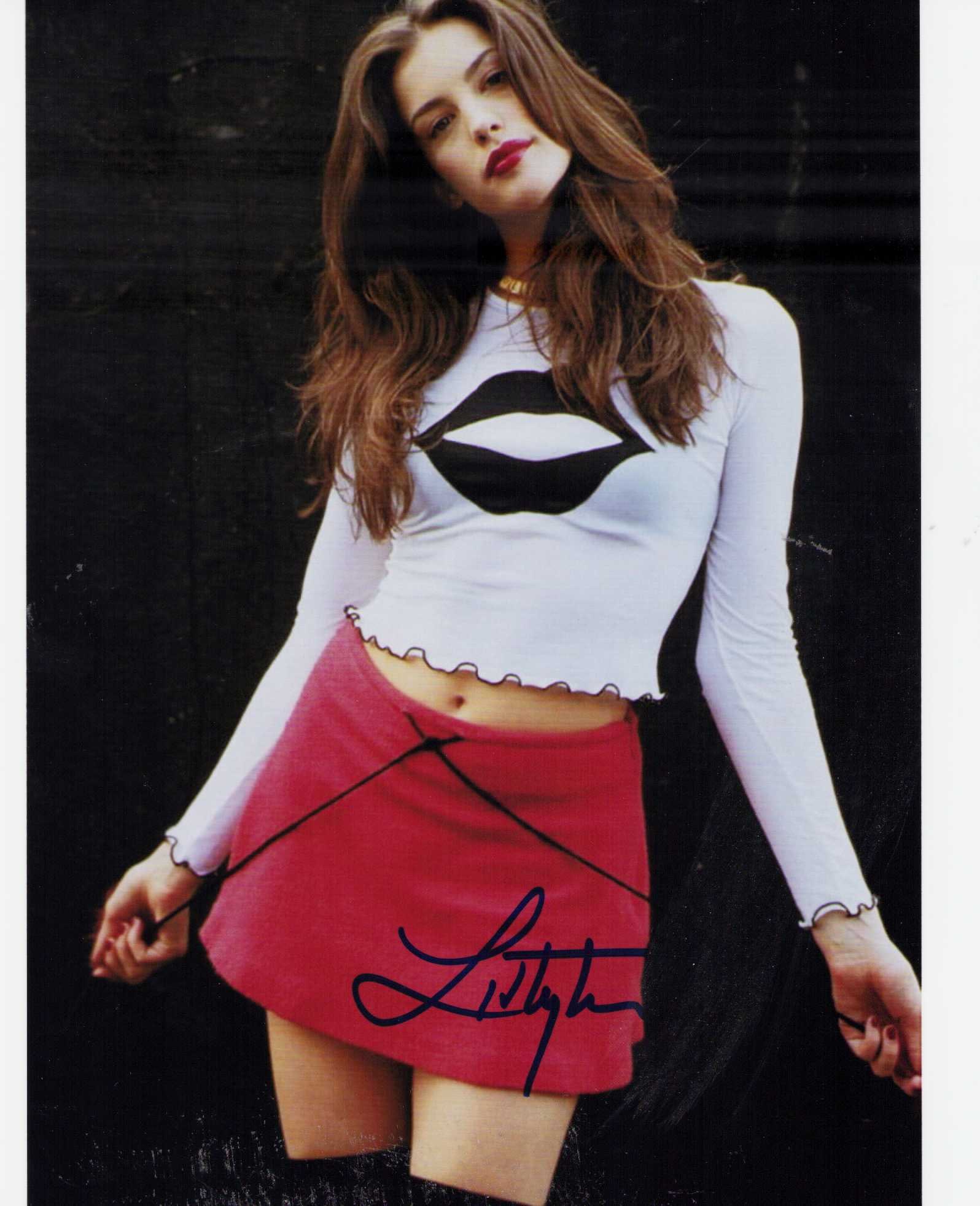 Liv Tyler signed photograph: A sexy young signed 8x10 of the Lord of the Rings Pearl Harbor etc star Certificate of AuthenticityEVERY item in this auction comes with at minimum one fully illustrated and serial numbered COA signed