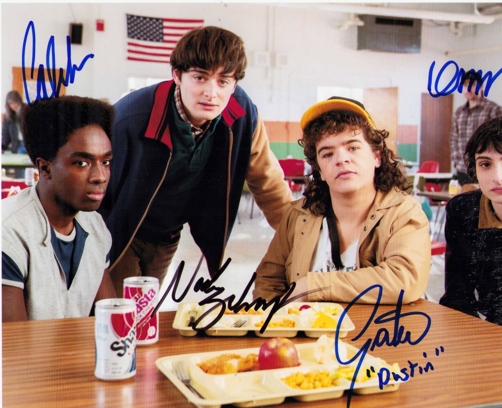 Stranger Things cast signed photograph: Rare cast signed 8x10 by Finn Woflhard, Noah Schapp, Caleb McLaughlin and Gaten Matarazza Certificate of AuthenticityEVERY item in this auction comes with at minimum one fully illustrated and serial n