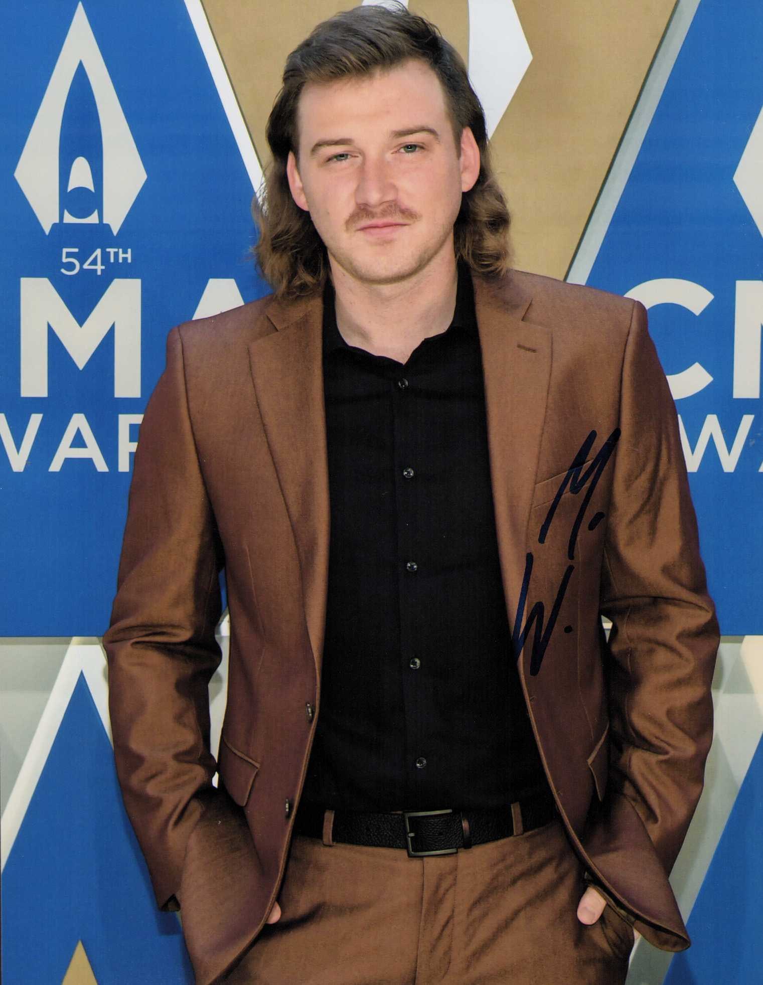 Morgan Wallen signed photograph: Signed 8x10 by country singer recently burst onto the scene Certificate of AuthenticityEVERY item in this auction comes with at minimum one fully illustrated and serial numbered COA signed by the