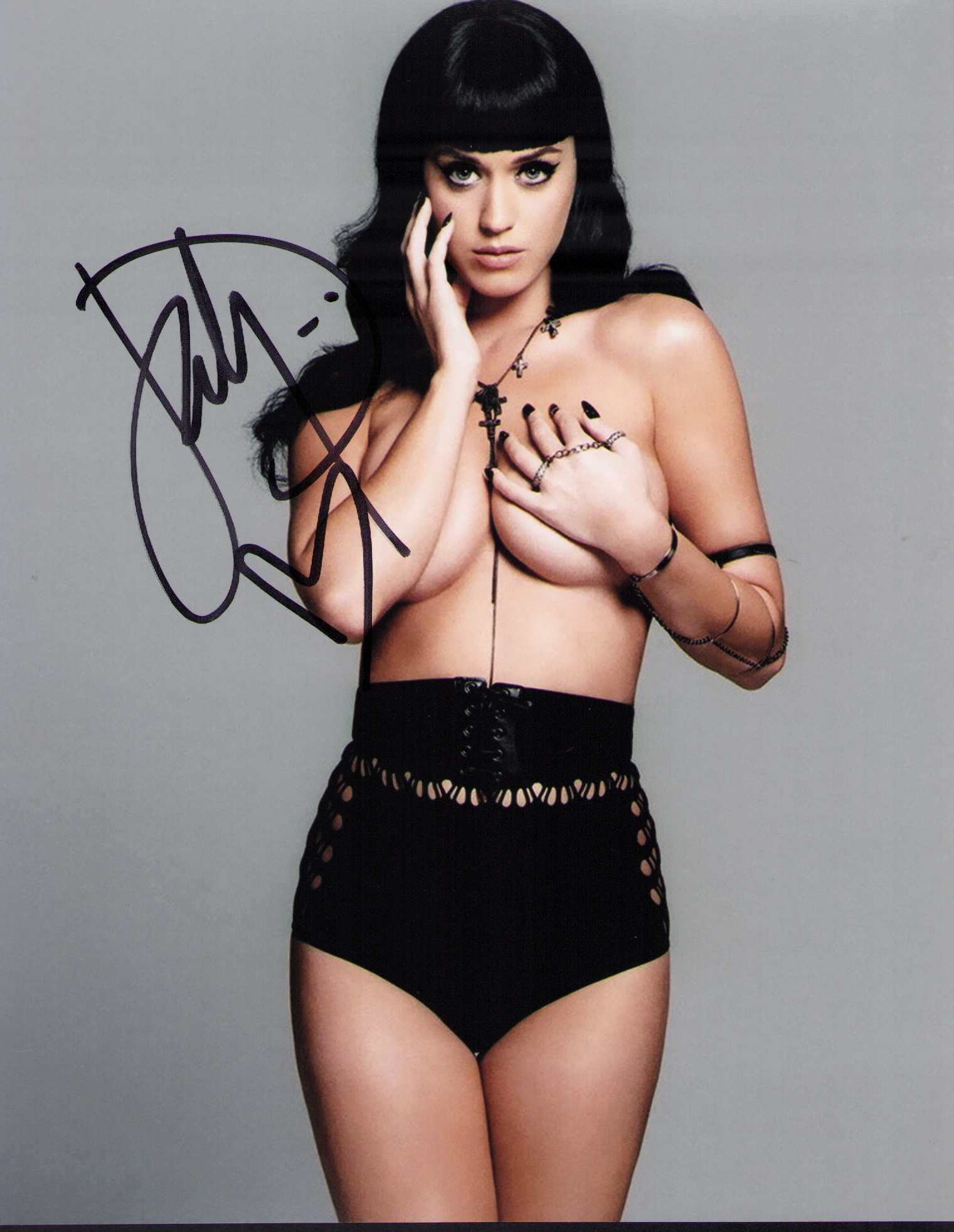 Katy Perry signed photograph: A scarce signed 8x10 of the pop singer and American Idol judge Certificate of AuthenticityEVERY item in this auction comes with at minimum one fully illustrated and serial numbered COA signed by the