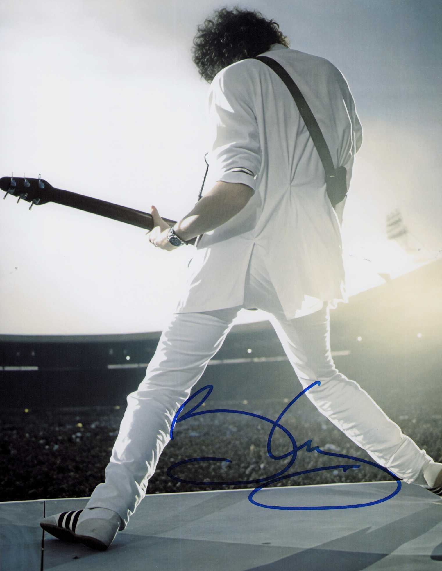 Brian May signed photograph: Rare signed 8x10 of QUEENS lead guitarist Brian May Certificate of AuthenticityEVERY item in this auction comes with at minimum one fully illustrated and serial numbered COA signed by the leading