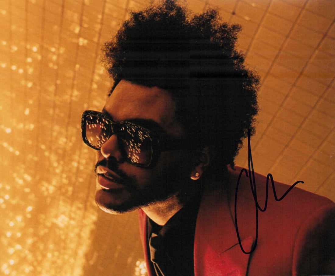 The Weeknd signed photograph: Scarce signer singer WeekND of such hits as I Cant Feel My Face Certificate of AuthenticityEVERY item in this auction comes with at minimum one fully illustrated and serial numbered COA signed by the 