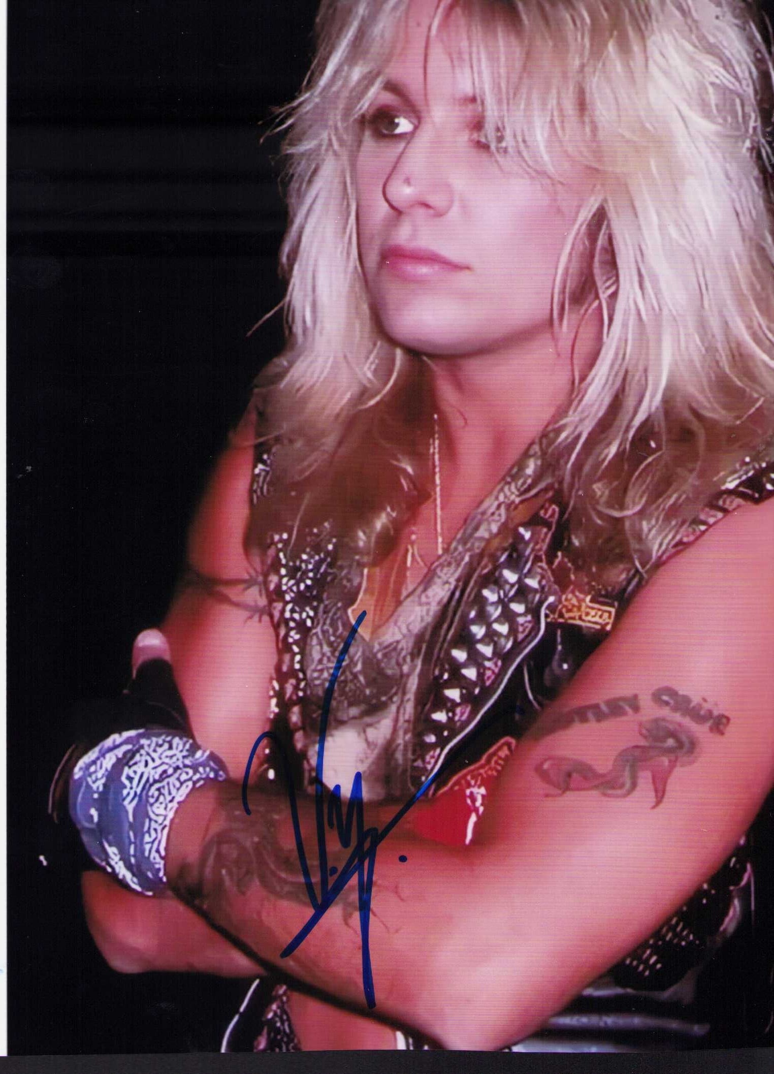 Vince Neil signed photograph: Lead singer of Motley Crue signed 8x10 stage shot Certificate of AuthenticityEVERY item in this auction comes with at minimum one fully illustrated and serial numbered COA signed by the leading authen