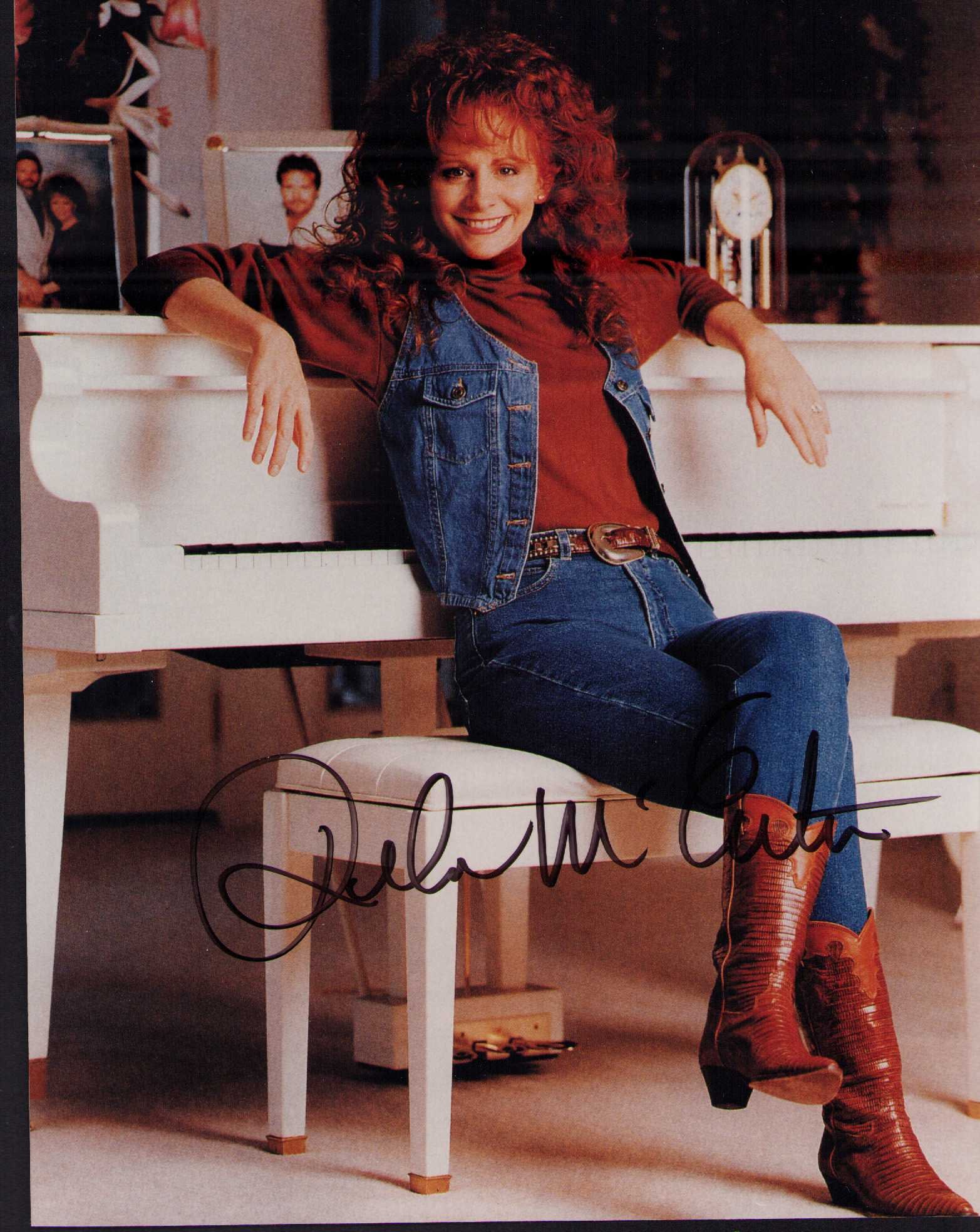 Reba McEntire signed photograph: A nice signed 8x10 by the reigning Queen of Country Certificate of AuthenticityEVERY item in this auction comes with at minimum one fully illustrated and serial numbered COA signed by the leading