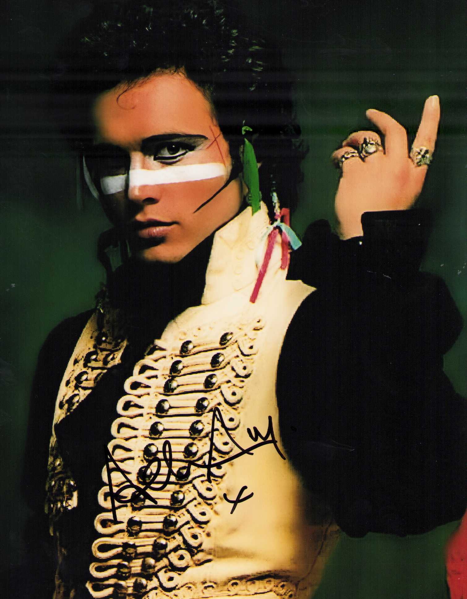 Adam Ant signed photograph: A scarce signed 8x10 of the 80s Goody Two Shoes pop sensation Certificate of AuthenticityEVERY item in this auction comes with at minimum one fully illustrated and serial numbered COA signed by the