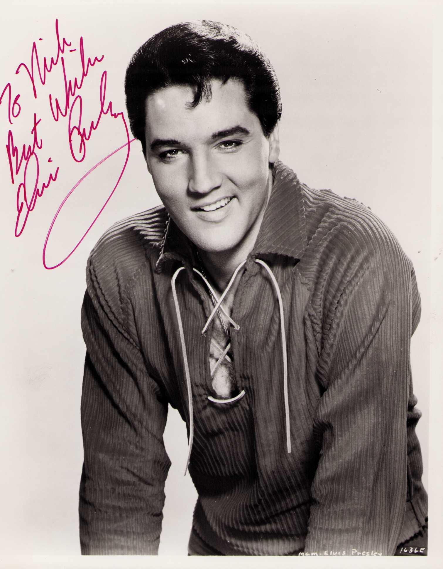 Elvis Presley signed photograph: A wonderful vintage signed 60s photograph 8x10 of the King of Rock n Roll himself ! Certificate of AuthenticityEVERY item in this auction comes with at minimum one fully illustrated and serial numbere
