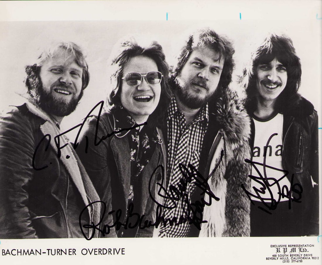 BTO signed photograph: A vintage Bachman Turner Overdrive signed 8x10 by the band scarce Certificate of AuthenticityEVERY item in this auction comes with at minimum one fully illustrated and serial numbered COA signed by