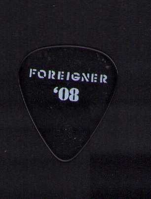 Mick Jones stage used guitar pick: A stage used Mick Jones of Foreignor guitar pick obtained from famed roadie Certificate of AuthenticityEVERY item in this auction comes with at minimum one fully illustrated and serial numbered COA si