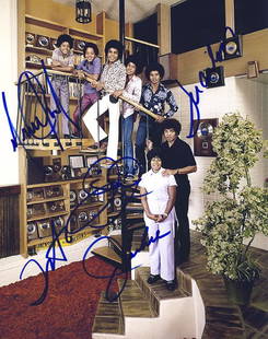 The Jackson Five Signed 8x10 Family Photo: This is an 8x10 photograph signed in person by all five members of the "Jackson Five". This rare photo features Joe and Katherine Jackson with their children Michael, Marlon, Tito, Randy and