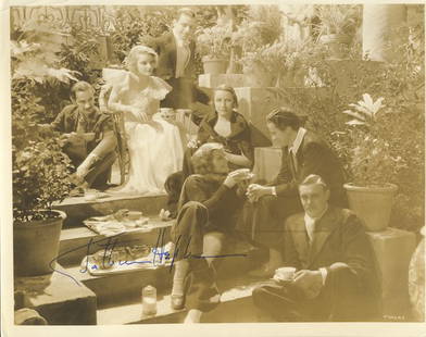 Katharine Hepburn Vintage 1930s Signed 8x10 Photograph: This is an original sepia toned 8x10 photograph signed by the legendary actress Katharine Hepburn. Taken in the 1930s, this still depicts the radio cast of "Great Desire" having tea after a long day