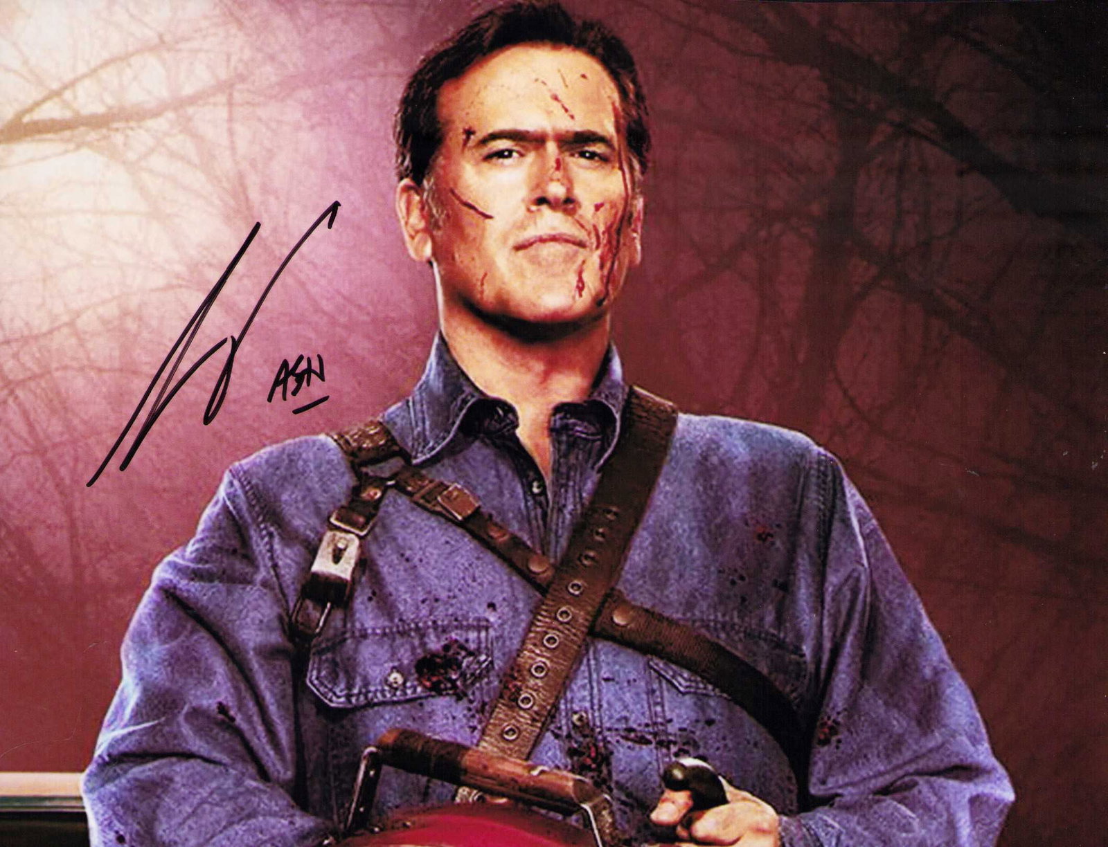 Bruce Campbell Evil Dead signed photograph: Scarce signer Campbell in an Evil Dead shot he has added his characters name ASH as well even rarer Certificate of AuthenticityEVERY item in this auction comes with at minimum one fully illustrated an