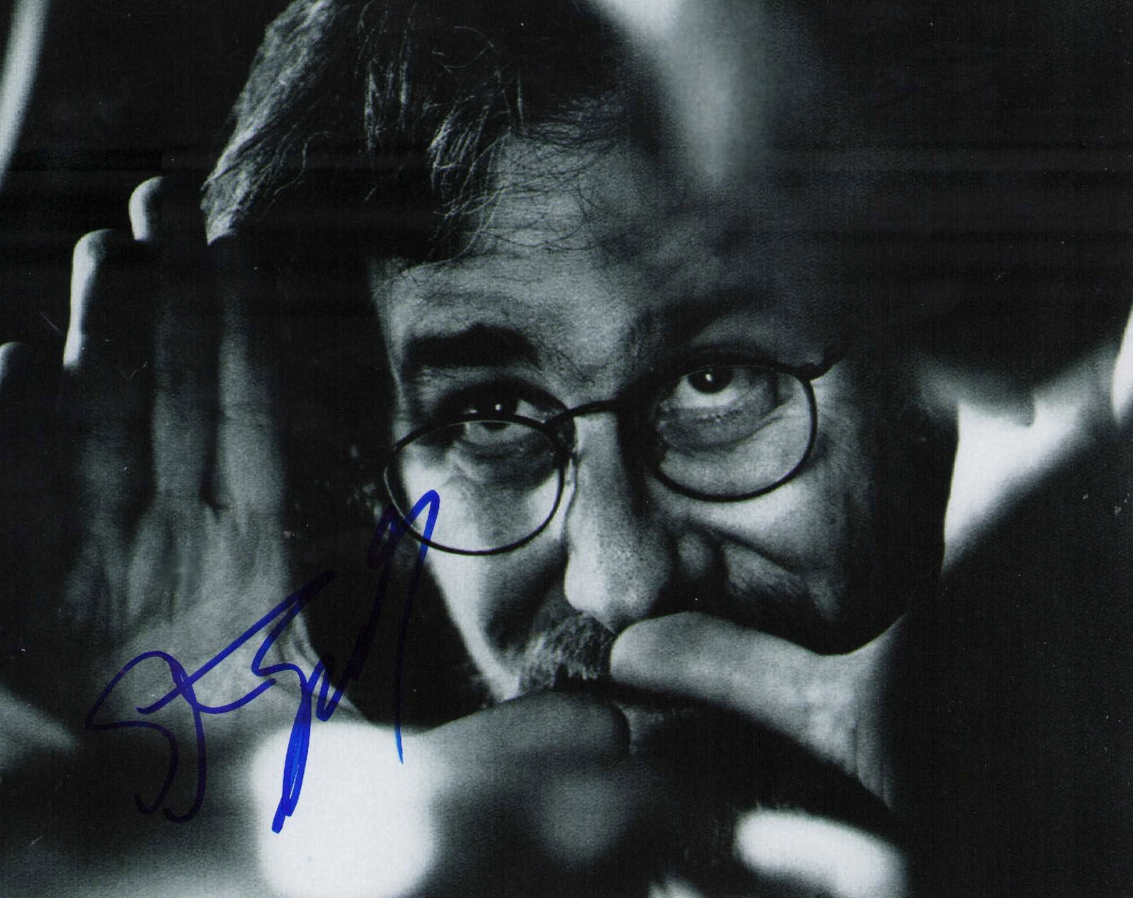Steven Spielberg signed photograph: A signed 8x10 by the great Director framing shot ! Certificate of AuthenticityEVERY item in this auction comes with at minimum one fully illustrated and serial numbered COA signed by the leading