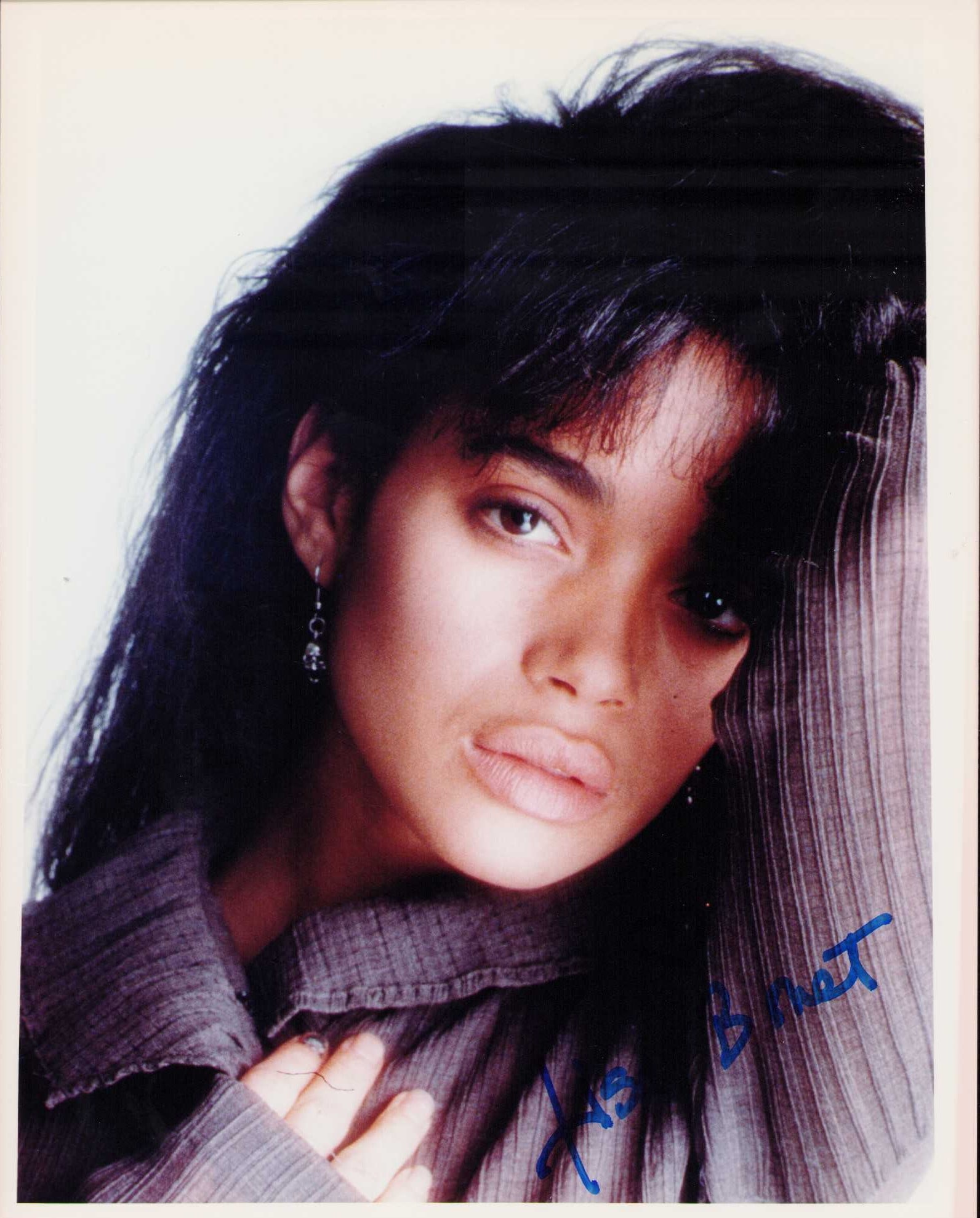 Lisa Bonet signed photograph: A sexy young signed vintage 8x10 of the Cosby show actress Certificate of AuthenticityEVERY item in this auction comes with at minimum one fully illustrated and serial numbered COA signed by the leadi