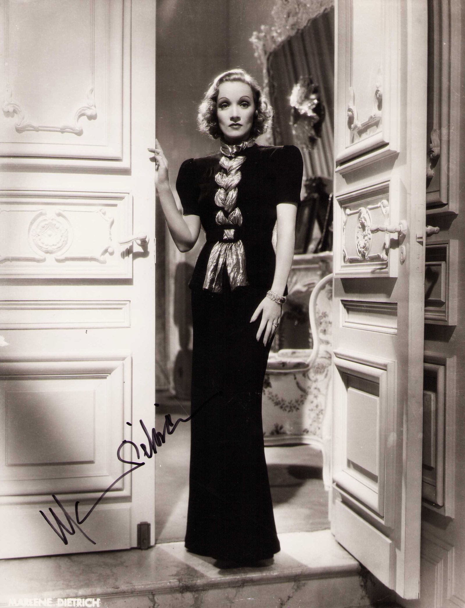 Marlene Dietrich signed 11x14 photograph: A fantastic 11x14 of the legendary actress signed nicely Certificate of AuthenticityEVERY item in this auction comes with at minimum one fully illustrated and serial numbered COA signed by the leading