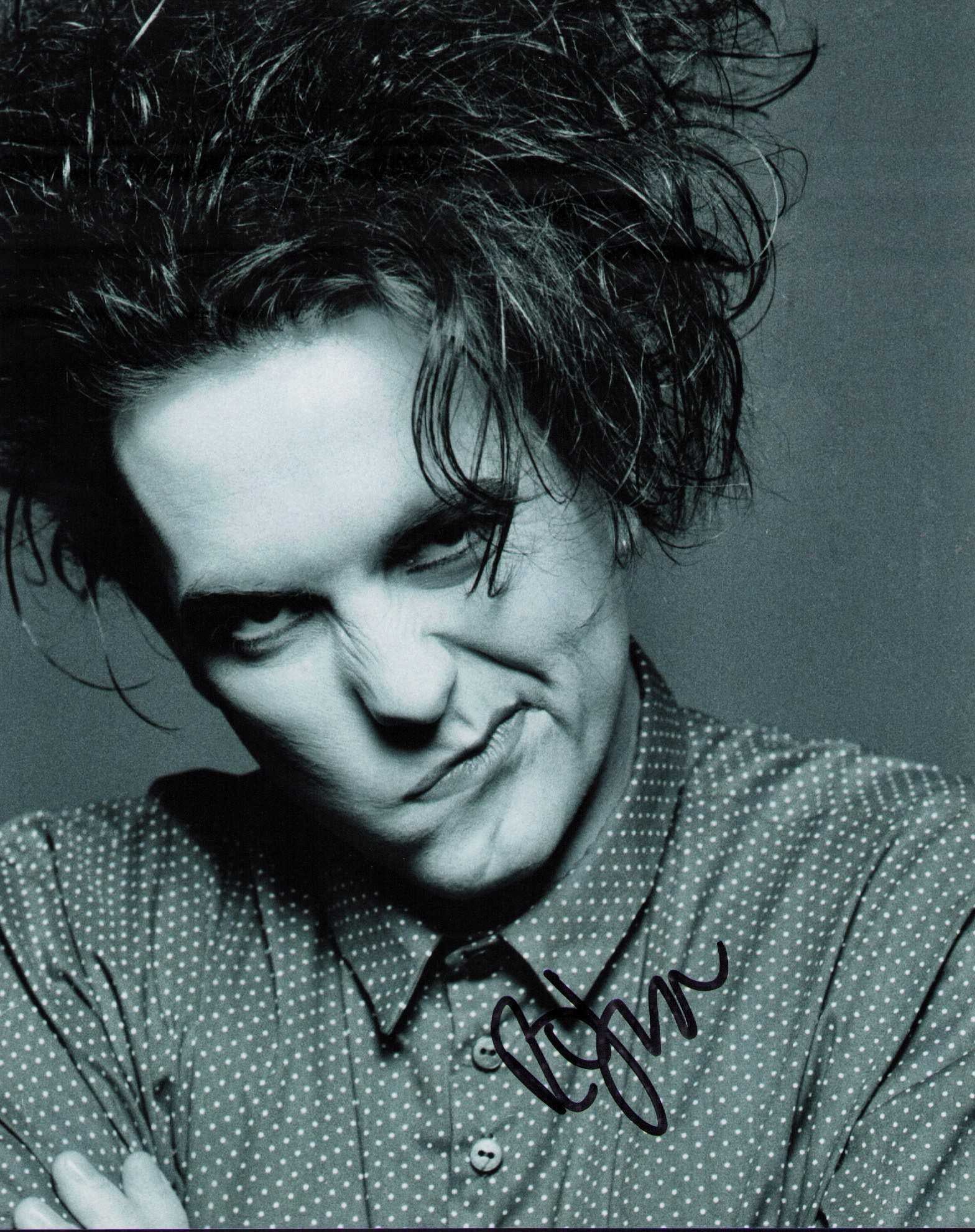 The Cure Robert Smith signed photograph: The band the Cure signed by lead singer Robert Smith 8x10 Certificate of AuthenticityEVERY item in this auction comes with at minimum one fully illustrated and serial numbered searchable online COA