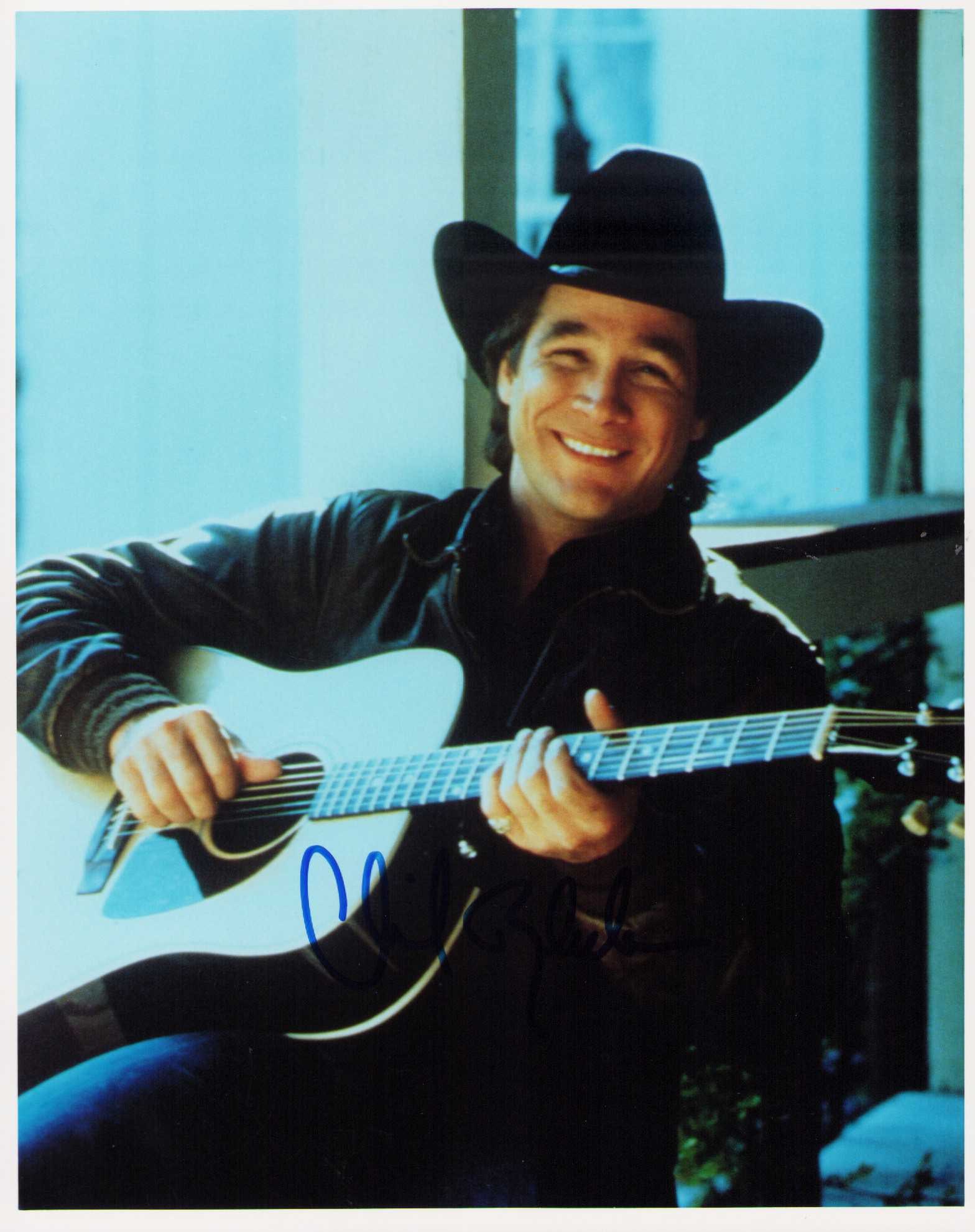 Clint Black signed photograph: The country music legend signed 8x10 photograph Certificate of AuthenticityEVERY item in this auction comes with at minimum one fully illustrated and serial numbered searchable online COA signed by th