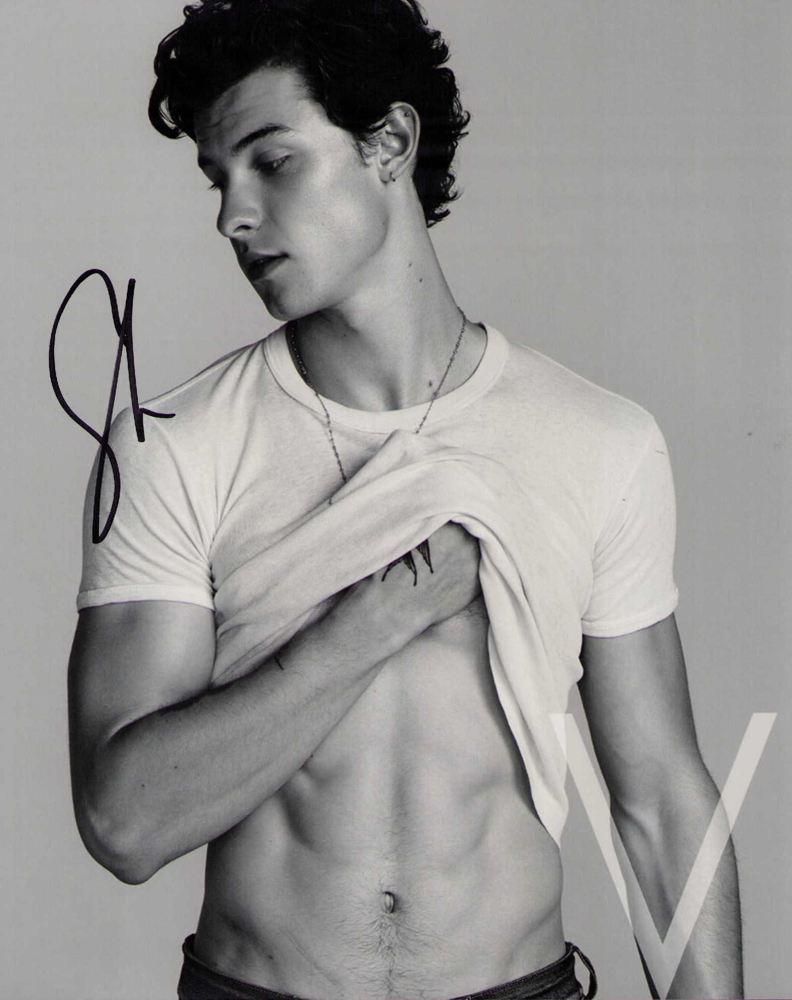 Shawn Mendes signed photograph: Sexy shot of pop singer Shawn Mendes Certificate of AuthenticityEVERY item in this auction comes with at minimum one fully illustrated and serial numbered searchable online COA signed by the leading