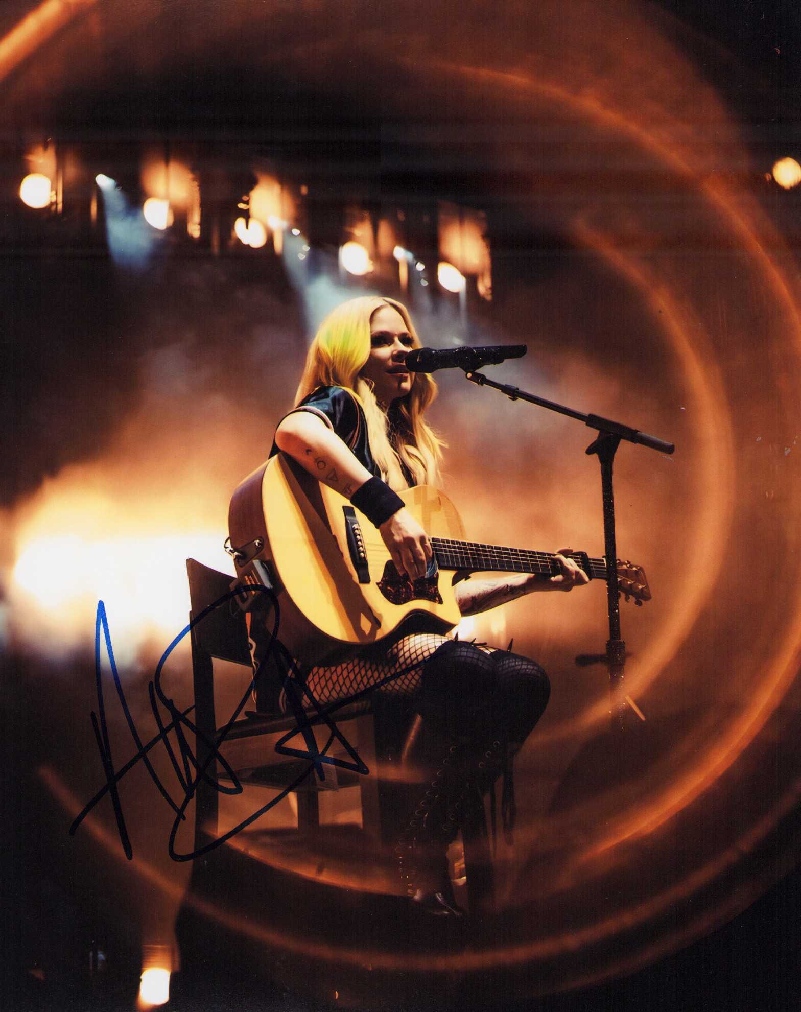Avril Lavigne signed photograph: Sexy pop rock star scarce signer 8x10 Certificate of AuthenticityEVERY item in this auction comes with at minimum one fully illustrated and serial numbered searchable online COA signed by the leading 