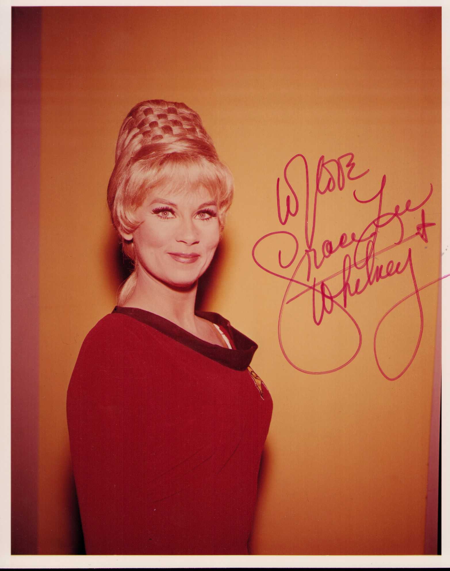 Grace Lee Whitney signed Star Trek photograph: A nice vintage signed 8x10 by original Trek cast member Whitney as Yeohman Janice Rand Certificate of AuthenticityEVERY item in this auction comes with at minimum one fully illustrated and serial