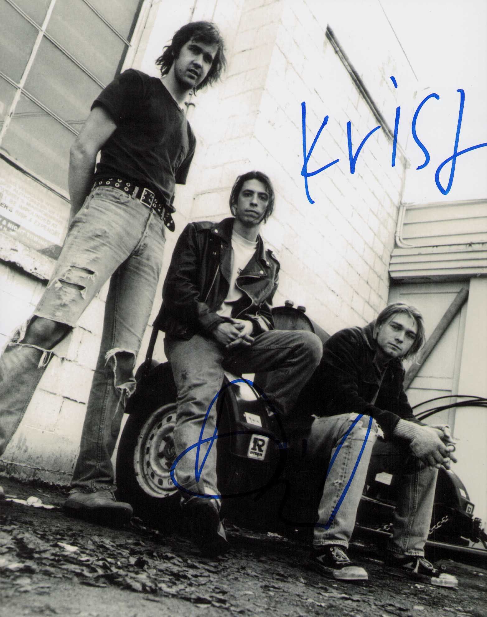 Nirvana signed photograph: A Nirvana signed 8x10 by Krist (Novoselic) and Dave (Grohl) not Kurt of course Certificate of AuthenticityEVERY item in this auction comes with at minimum one fully illustrated and serial numbered