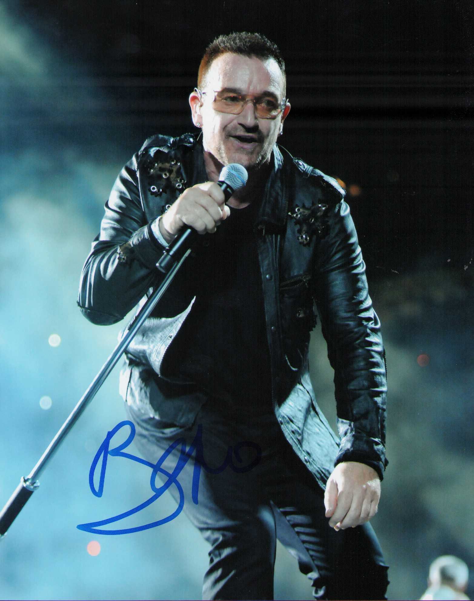 U2s BONO signed photograph: U2 front man Bono signed 8x10 scarce Certificate of AuthenticityEVERY item in this auction comes with at minimum one fully illustrated and serial numbered searchable online COA signed by the leading