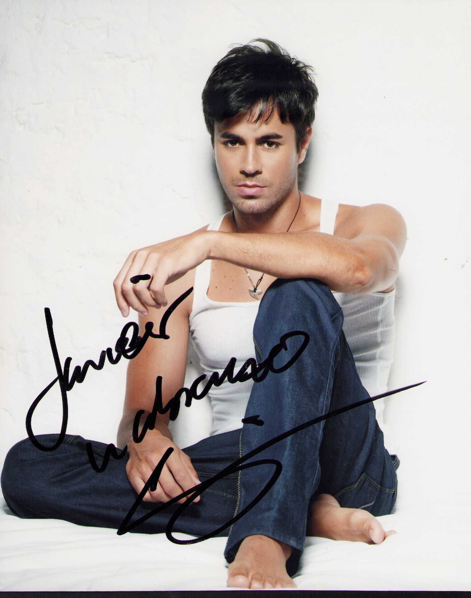 Enrique Iglesias signed photograph: Sexy Latin singing sensation signed 8x10 photograph Certificate of AuthenticityEVERY item in this auction comes with at minimum one fully illustrated and serial numbered searchable online COA signed