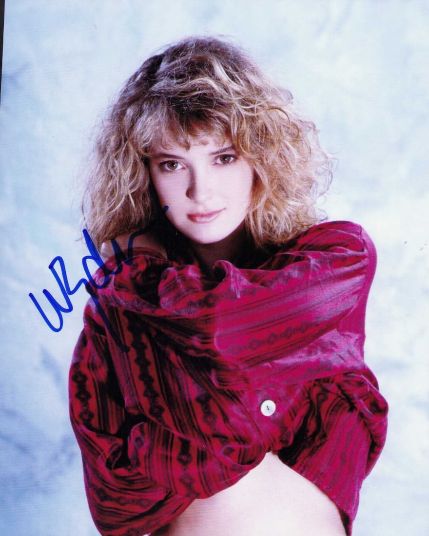 Winona Ryder signed photograph: A nice signed 8x10 by the actress and scarce signer Certificate of AuthenticityEVERY item in this auction comes with at minimum one fully illustrated and serial numbered searchable online COA signed b