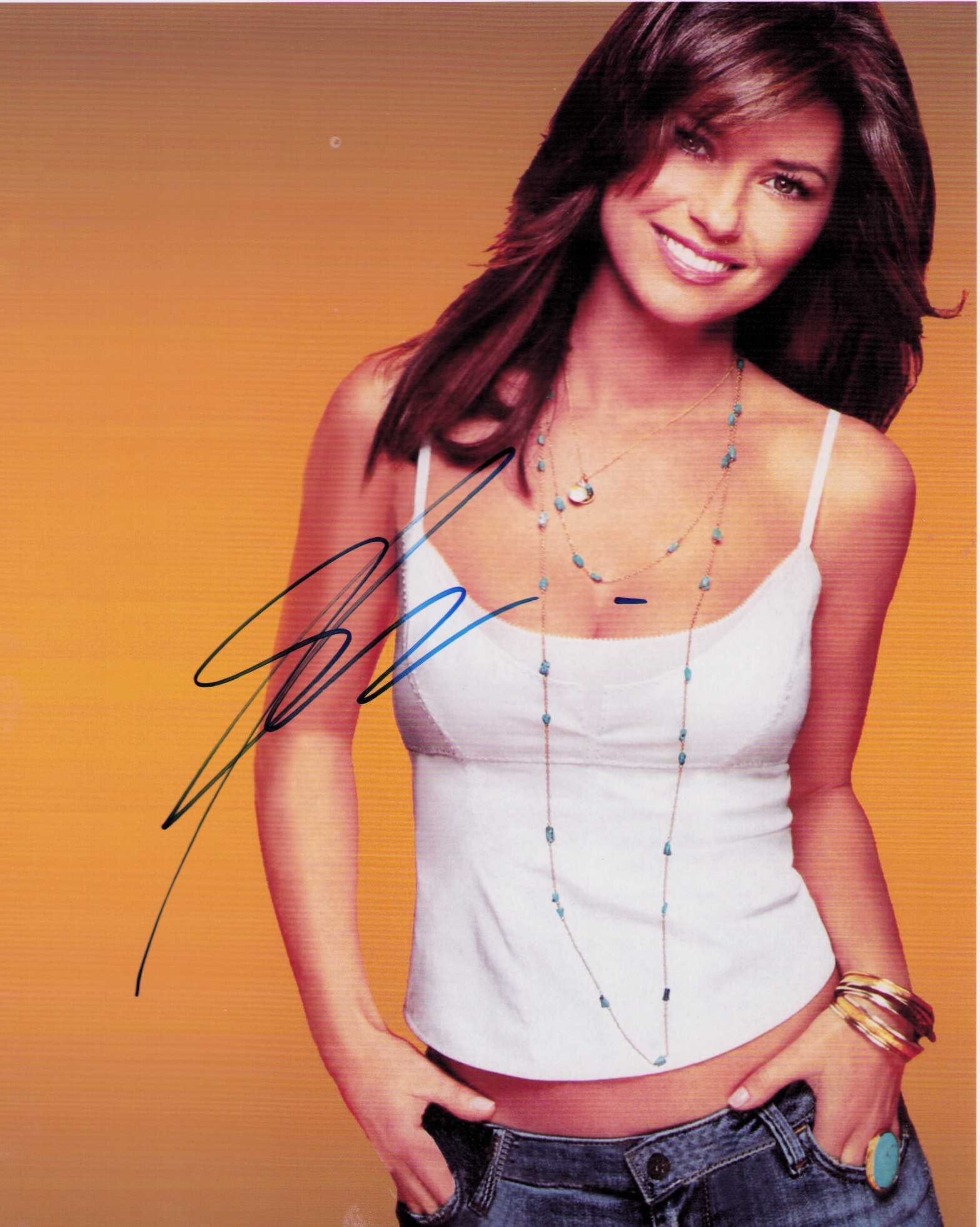 Shania Twain signed photograph: Shania Twaiin vintage signed 8x10 nice ! Certificate of AuthenticityEVERY item in this auction comes with at minimum one fully illustrated and serial numbered searchable online COA signed by the