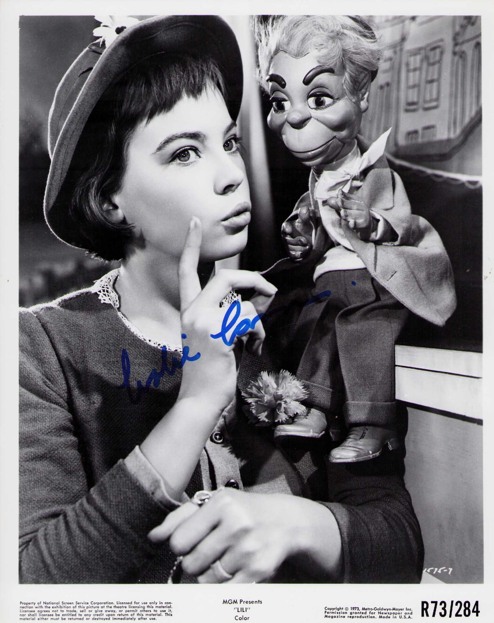 Leslie Caron signed photograph: A LILI signed original still by the GIGI star Certificate of AuthenticityEVERY item in this auction comes with at minimum one fully illustrated and serial numbered searchable online COA signed by the 