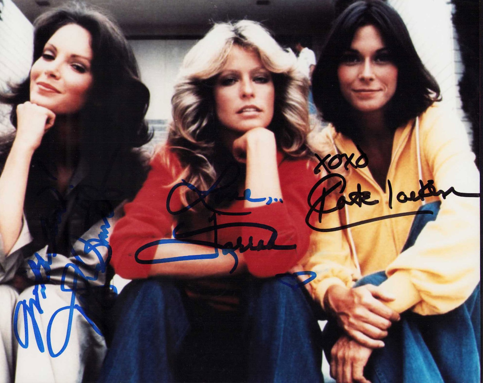 Charlies Angels cast signed photograph: A scarce vintage signed cast 8x10 by Farrah Fawcett Jaclyn Smith and Kate Jackson Certificate of AuthenticityEVERY item in this auction comes with at minimum one fully illustrated and serial numbered 