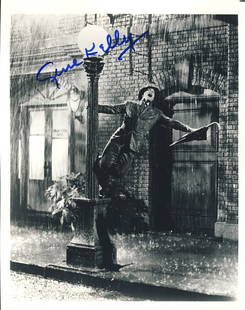 Gene Kelly "Singin' in the Rain" Signed 8x10 Photo: This 8x10 photograph features a classic image from the film "Singin' in the Rain" and is signed by the late legendary Gene Kelly. The signature was obtained in person by an autograph collector.