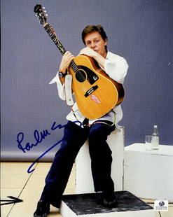 Sir Paul McCartney Signed 8x10 Photograph: This is an 8x10 photograph signed by "The Beatles" legend Sir Paul McCartney. The photo features Paul cradling an acoustic guitar. It has been certified by Global Authentics and issued number