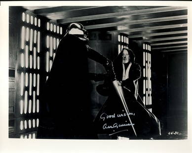 Sir Alec Guinness "Star Wars" Signed 8x10 Photograph: This is an 8x10 photograph of Sir Alec Guinness in his role as 'Obi Wan Kenobi' fighting 'Darth Vader' in the cult classic sci-fi film "Star Wars". The photo has been signed in silver ink with "good