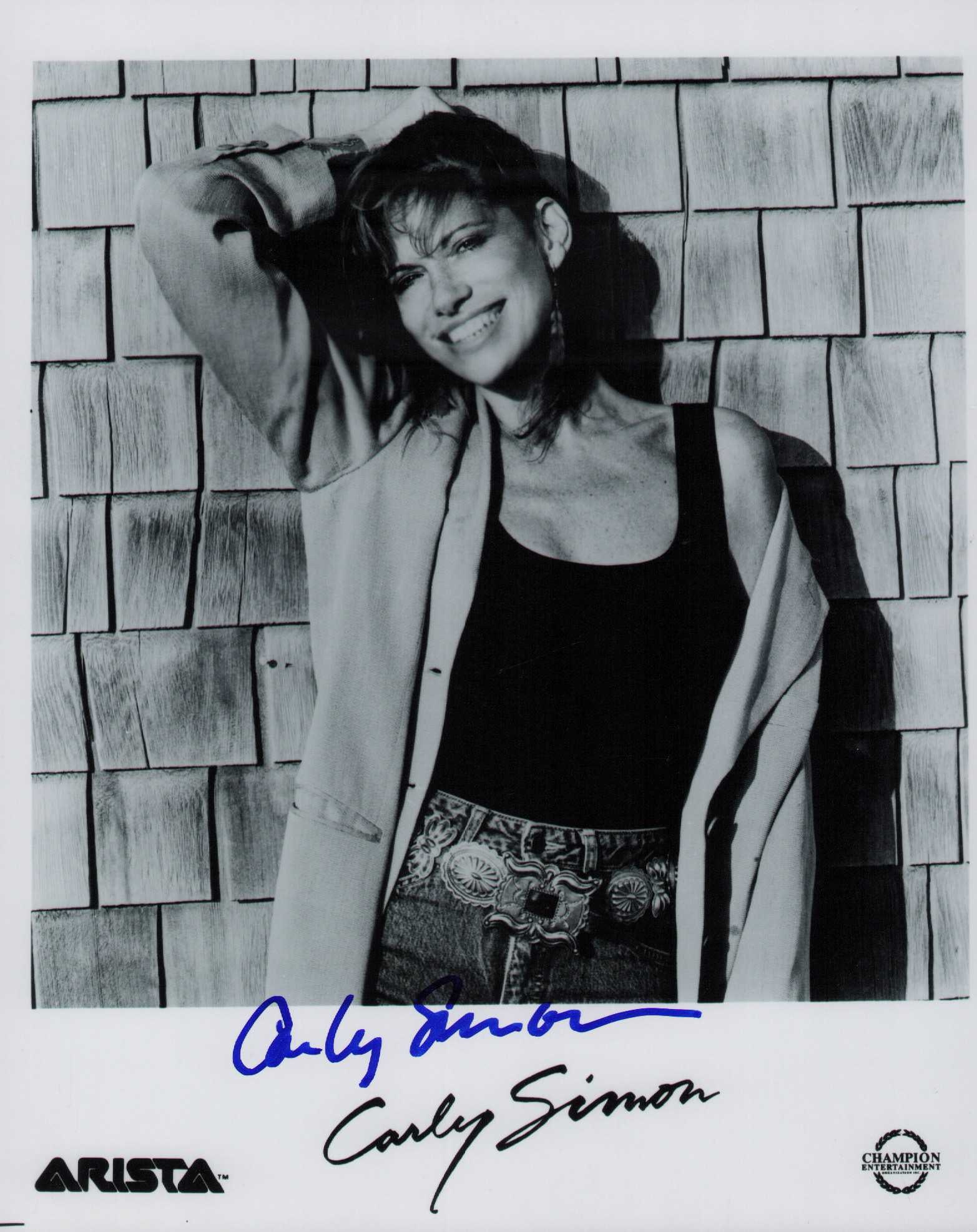 Carly Simon signed photograph: A scarce signed 8x10 by the legendary singer songwriter Certificate of AuthenticityEVERY item in this auction comes with at minimum one fully illustrated and serial numbered searchable online COA sign