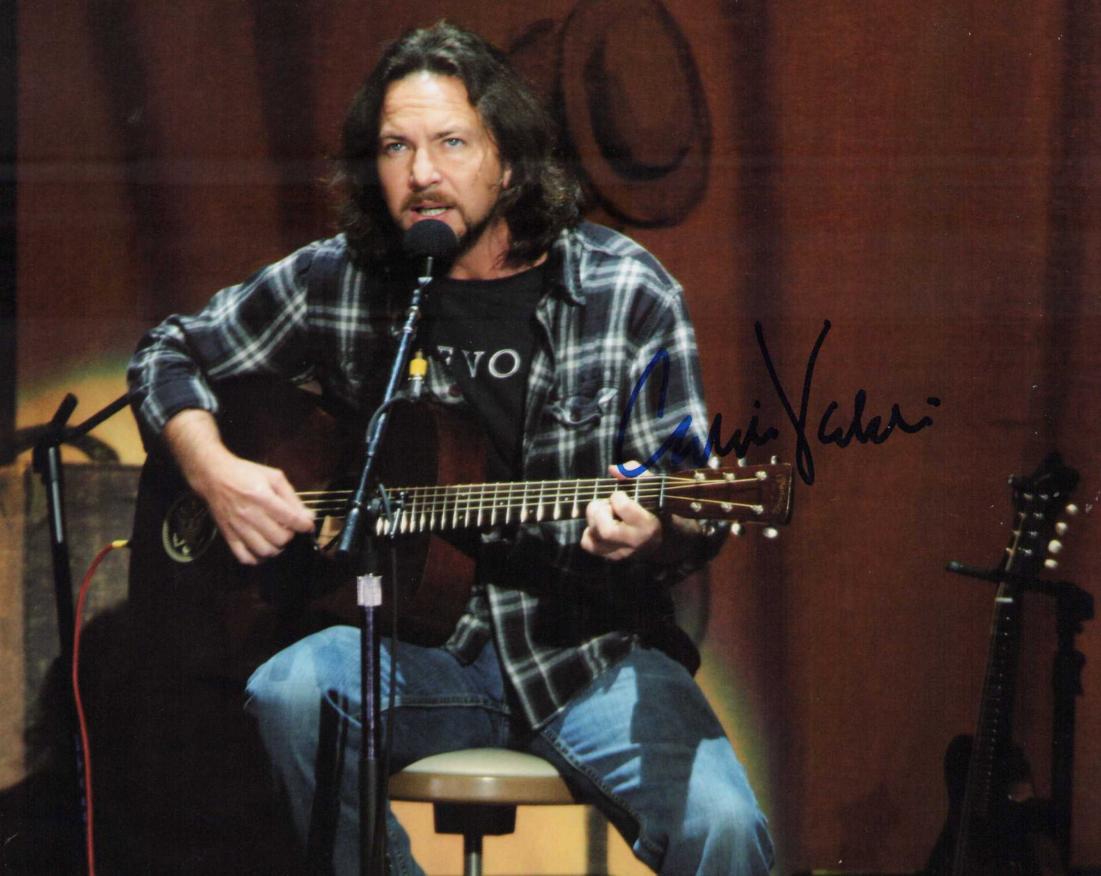 Eddie Vedder signed photogrph Pearl Jam: An Eddie Vedder signed 8x10 (lead to Pearl Jam) Certificate of AuthenticityEVERY item in this auction comes with at minimum one fully illustrated and serial numbered searchable online COA signed by th