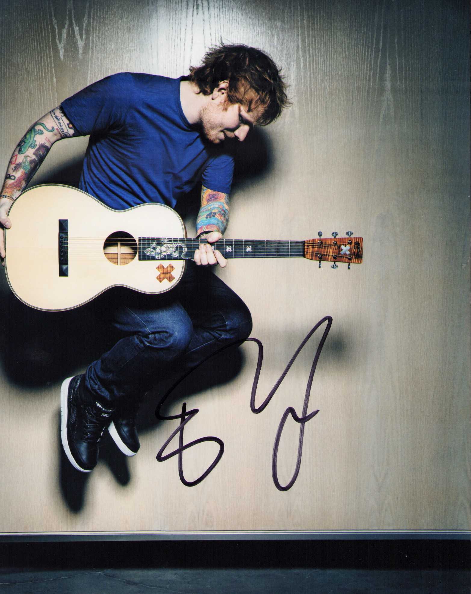 Ed Sheerhan signed photograph: Signed by pop star 8x10 photograph Certificate of AuthenticityEVERY item in this auction comes with at minimum one fully illustrated and serial numbered searchable online COA signed by the leading aut
