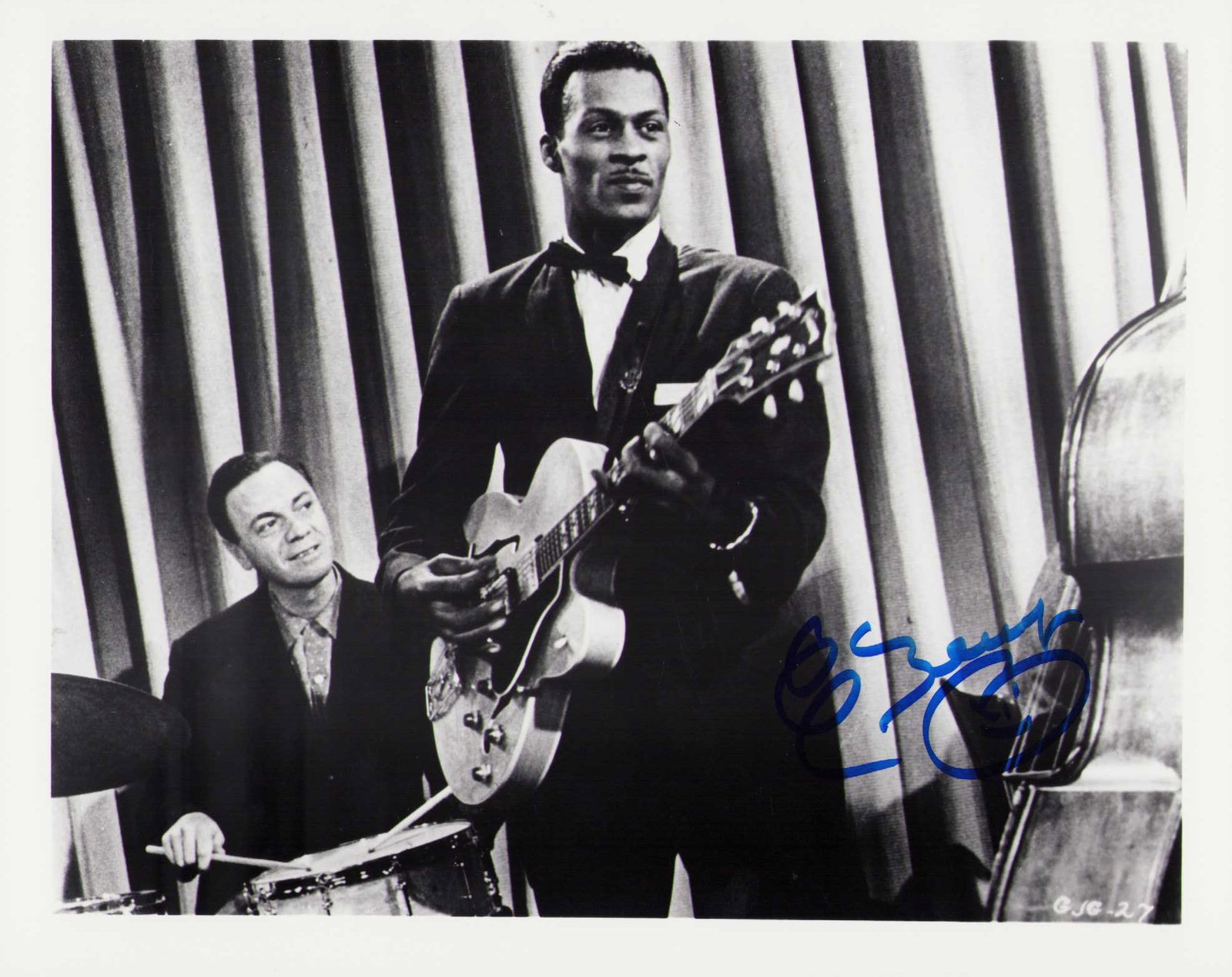 Chuck Berry signed photograph: A signed 8x10 by the rock pioneer and legend Certificate of AuthenticityEVERY item in this auction comes with at minimum one fully illustrated and serial numbered searchable online COA signed by the l