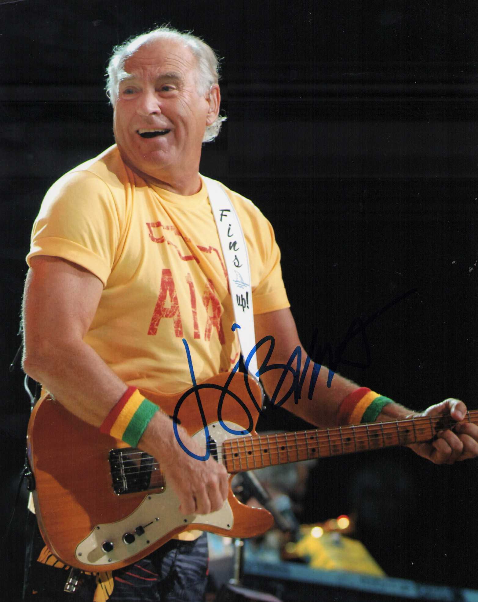 Jimmy Buffett signed photograph: A rare signer in life and now deceased the legend of Margaritaville himself Certificate of AuthenticityEVERY item in this auction comes with at minimum one fully illustrated and serial numbered search
