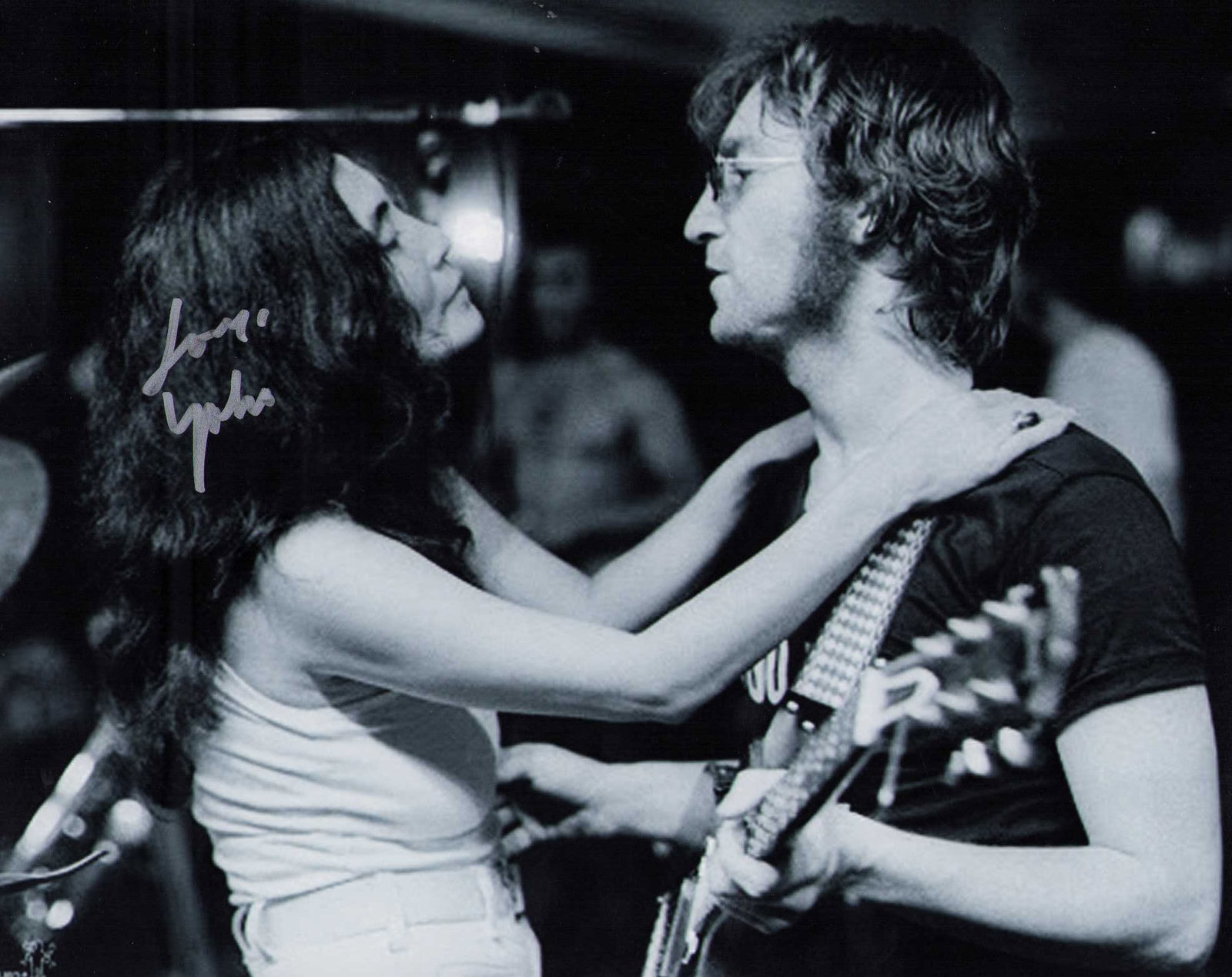 Yoko Ono signed photograph: A scarce signed 8x10 of John Lennons ex singer Yoko Ono Certificate of AuthenticityEVERY item in this auction comes with at minimum one fully illustrated and serial numbered searchable online COA