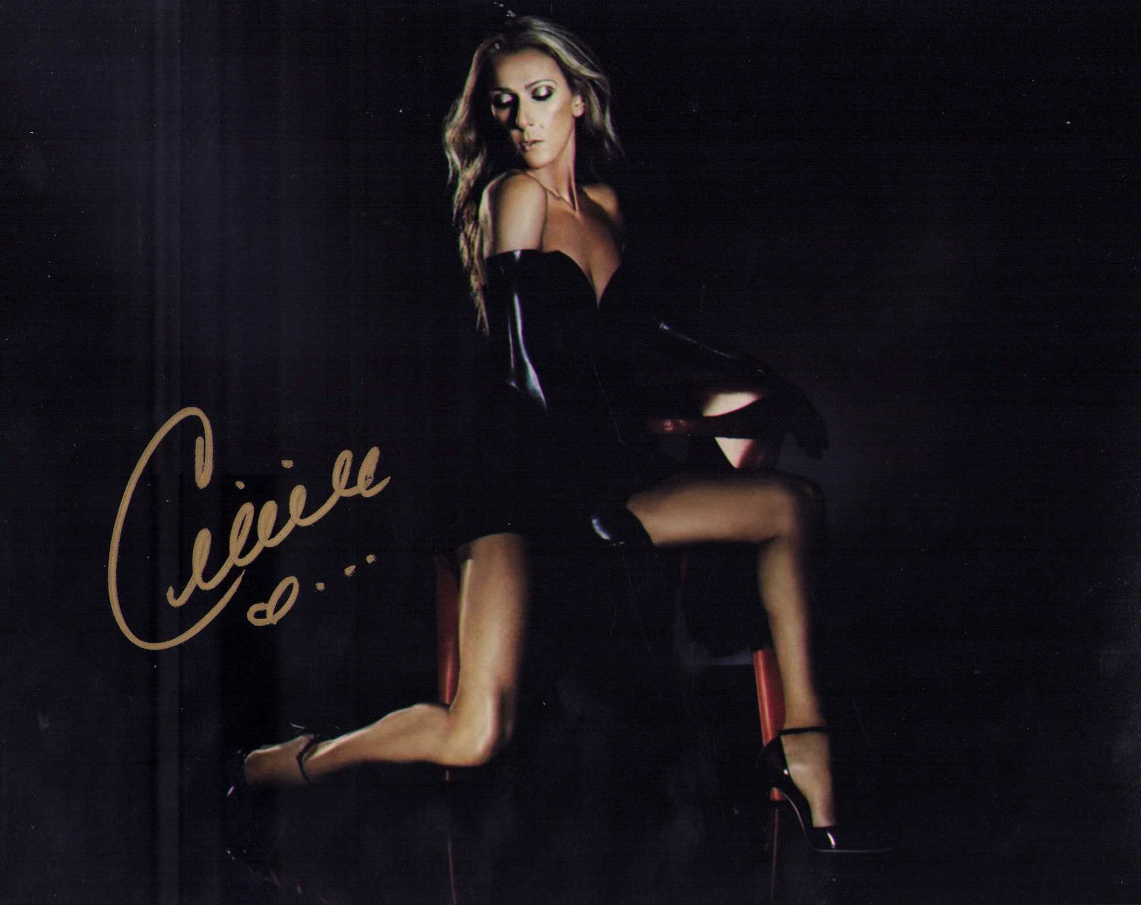 Celine Dion signed photograph: A fantastic signed 8x10 by the legendary singer Certificate of AuthenticityEVERY item in this auction comes with at minimum one fully illustrated and serial numbered searchable online COA signed by