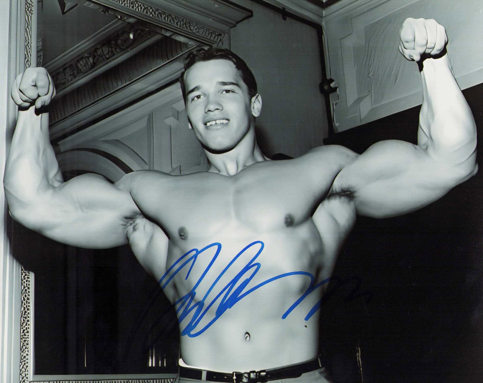 Arnold Schwarzenegger signed photograph: An EARLY muscle building shot of the legendary star signed in person 8x10 Certificate of AuthenticityEVERY item in this auction comes with at minimum one fully illustrated and serial numbered