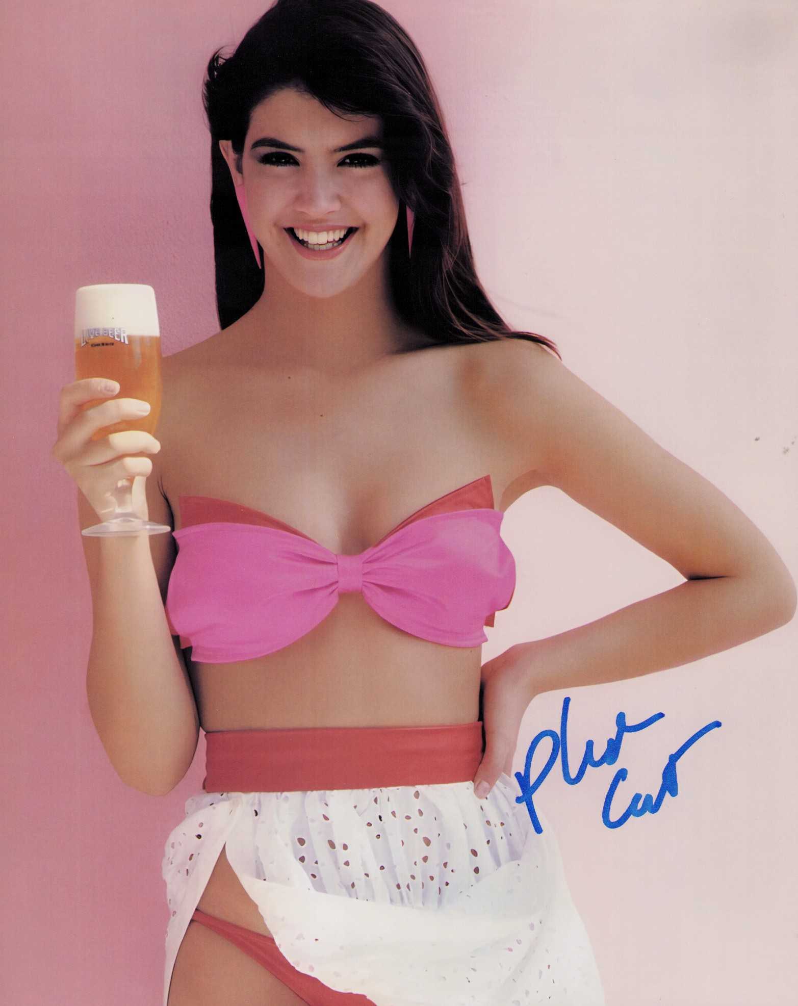 Phoebe Cates signed photograph: A cute vintage signed 8x10 of the rare star of Gremlins and Fast Times at Ridgemont High among others Certificate of AuthenticityEVERY item in this auction comes with at minimum one fully illustrated 