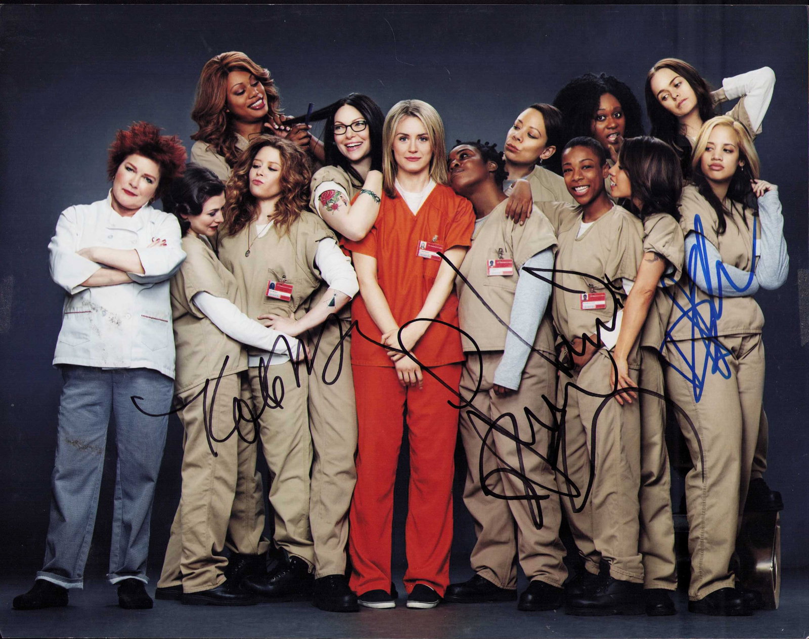 Orange is the New Black cast signed photo: A cast signed 8x10 by several of the stars of the series Certificate of AuthenticityEVERY item in this auction comes with at min one fully illustrated and serial numbered , searchable online COA