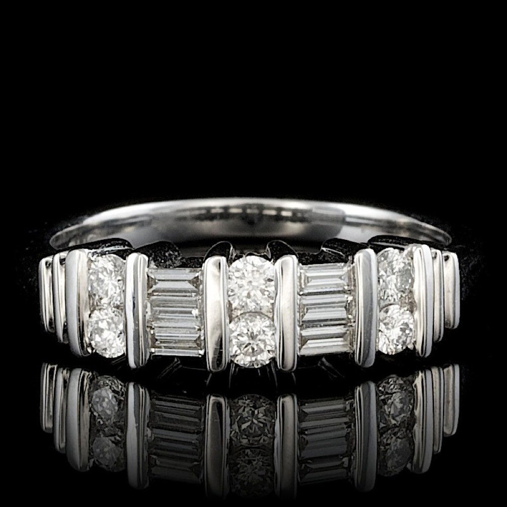18k White Gold .5ct Diamond Ring: Retail: $1,600.00 This elegant ladies ring is crafted in solid 18k White Gold and features 6 (0.25 ctw) 100% Natural Diamonds + accented with 6 sparkling eye-clean natural Diamonds, totaling 0.25 cara