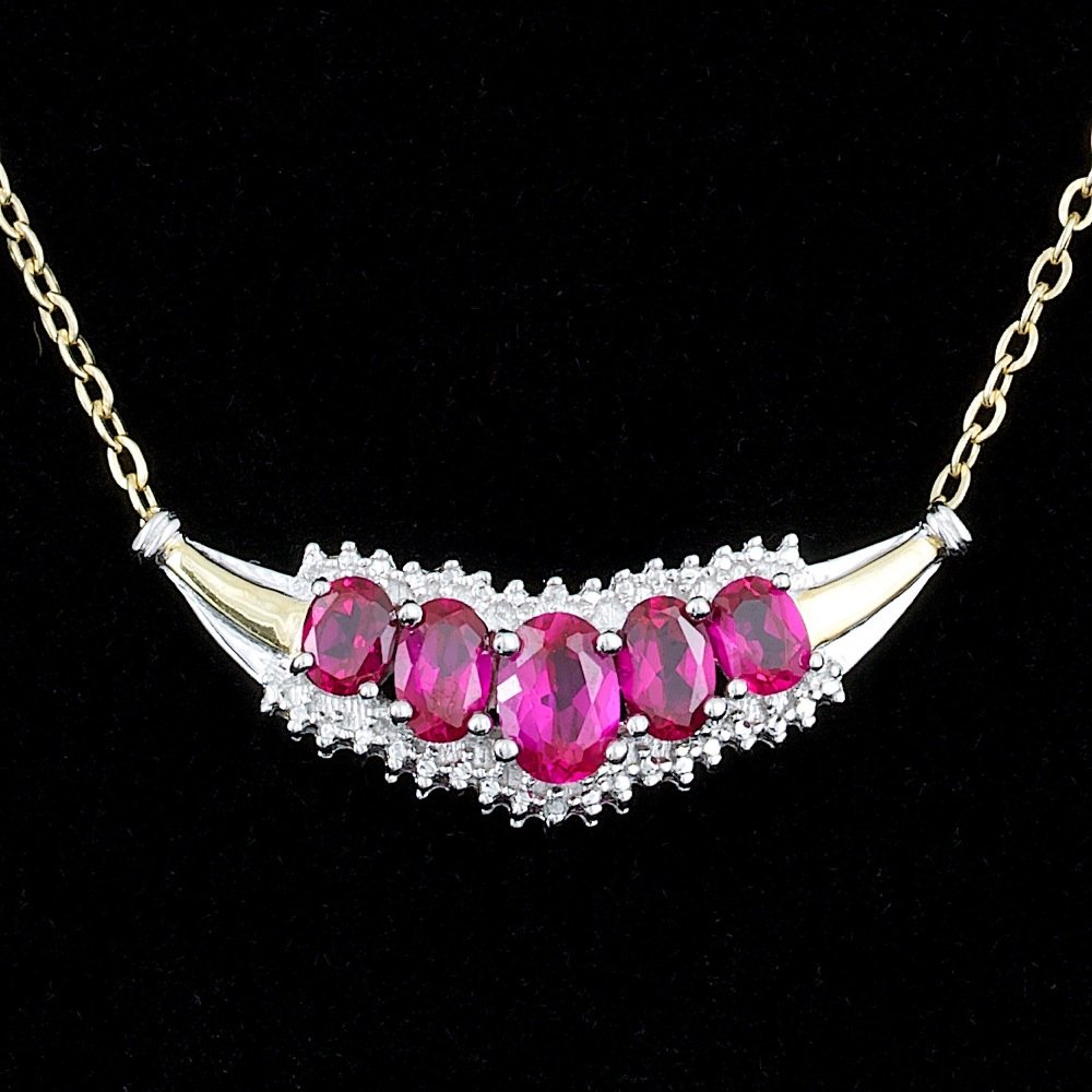 925 Silver 2.50ct Created Ruby & Diamond Necklace: Retail: $155.00 This lovely ladies necklace is crafted in solid .925, Sterling Silver and features 5 Created Rubies + accented with 2 sparkling eye-clean natural Diamonds, totaling 0.01 carats. Excell